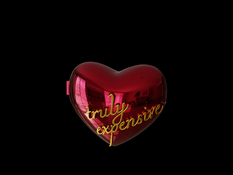 A heart locket, shut, with the words truly expensive in gold on
            its front
